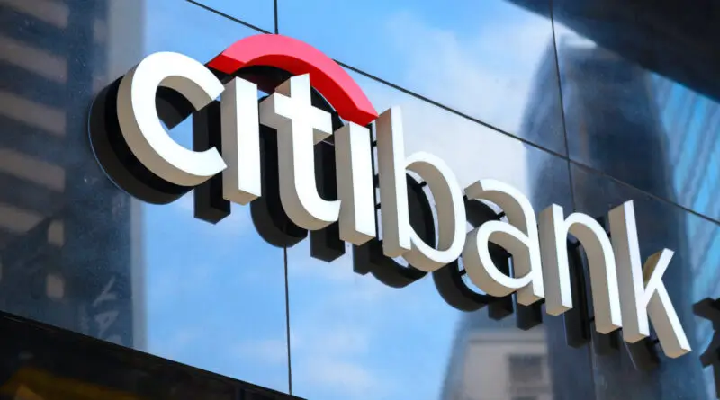 A photo of Citibank's logo from a brick and mortar office.