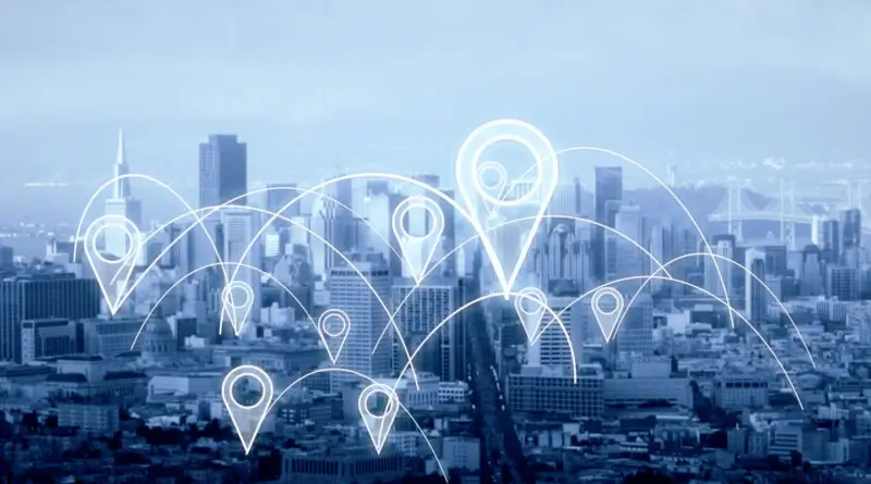 An illustration of a city with geolocation symbols.