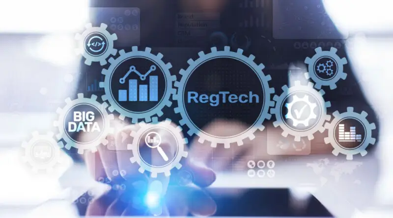 woman typing with RegTech text floating around her hands